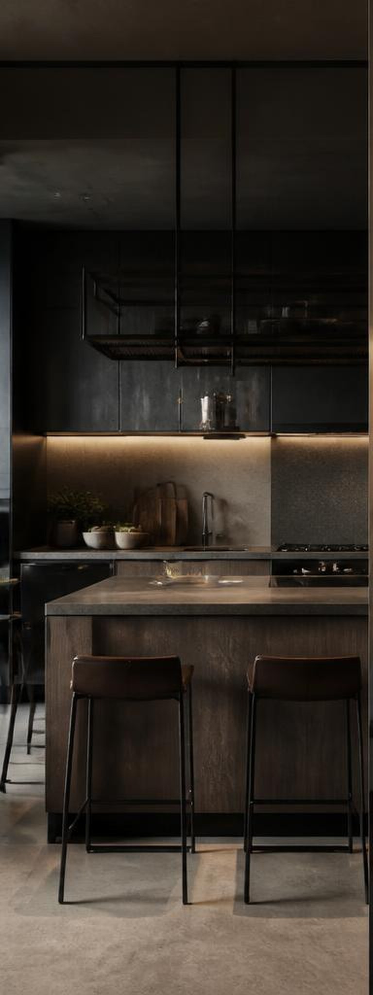 Industrial kitchen with black cabinetry and stone island