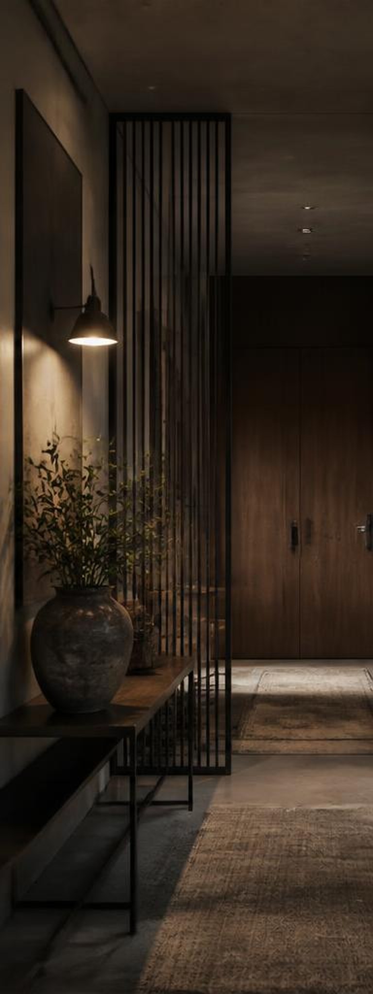 Industrial foyer with metal screen and timber door